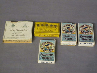 A small collection of cigarette cards