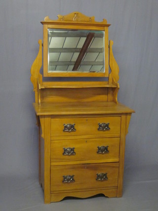 An Art Nouveau satinwood chest with mirror above 3 long  drawers, 33"