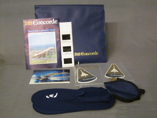 A small plastic wallet containing a collection of various Concord memorabilia