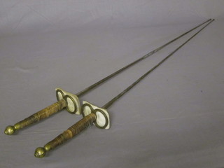 A pair of 19th Century Solingen fencing foils, the blades marked Solingen 34"