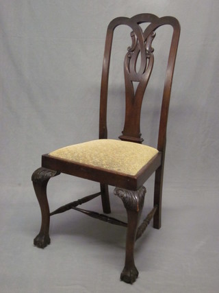 A Queen Anne style mahogany dining chair with vase shaped slat back and upholstered drop in seat, raised on cabriole supports  with H framed stretcher