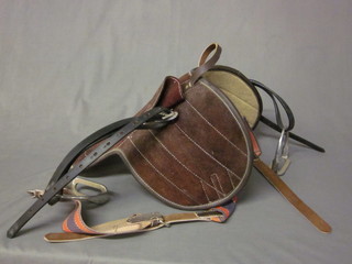 A lightweight saddle complete with stirrups