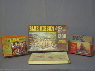A 1946 Phillips Globetrotter game, a Blue Ribbon jigsaw puzzle,  a Lyric puzzle, and a Waddingtons jigsaw puzzle