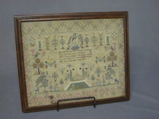 A Victorian woolwork sampler with garden scene and animals, having a motto to the centre and dated 1826, some holes, 12" x  14 1/2" ILLUSTRATED 