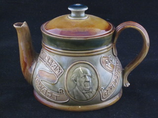 A Doulton Lambeth teapot decorated Gladstone, the reverse with  motto, the base impressed Doulton Lambeth 8568 4" ILLUSTRATED