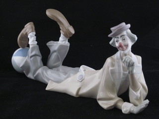 A Lladro figure of a reclining clown, the base impressed 4618 14 1/2" ILLUSTRATED