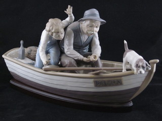 A Lladro figure group - Fishing with Gramps, base marked  5215, boy loose and missing fishing rod,boy with chips to fingers & fishing rod missing.