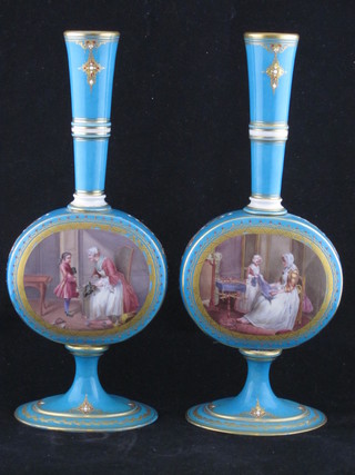 A handsome pair of 19th Century Sevres porcelain bottle shaped  vases decorated interior scenes, the bases with cypher mark,  marked L and with 3 dots, 11" ILLUSTRATED