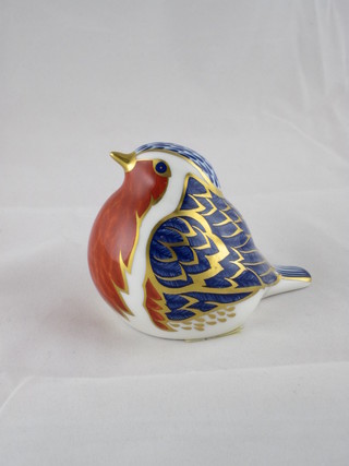 A Royal Crown Derby figure of a seated bird, the base marked  LXI, 3"