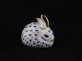 A Royal Crown Derby figure of a seated rabbit, the base marked LVI 3"