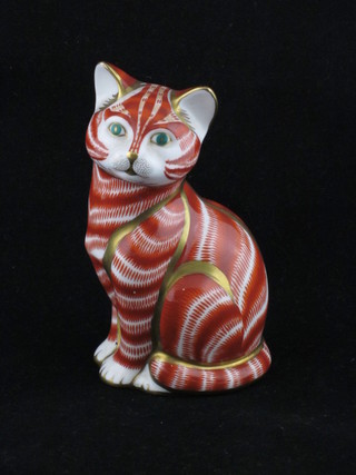 A Royal Crown Derby figure of a seated orange and gold cat, base marked LV 5"
