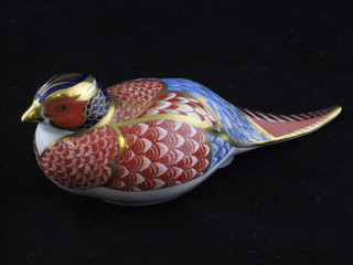A Royal Crown Derby figure of a seated cock pheasant, the base marked LV 6 1/2"