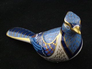 A Royal Crown Derby figure of a seated bird, base marked LIX