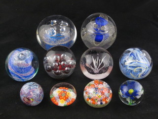 A Caithness Shemagh paperweight and 9 others