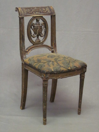 An Edwardian grey painted bar back salon chair with pierced decoration to the centre, raised on turned and fluted supports