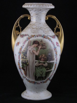 A pair of Edwardian Continental porcelain twin handled vases decorated interior scenes 13"