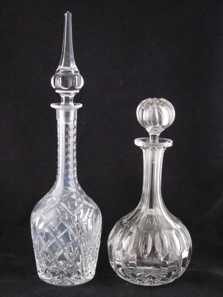 A mallet shaped cut glass decanter and stopper and 1 other