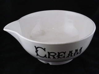 A Dairy Supplies white glazed 4 quart spouted cream bowl 12",  chipped and cracked,