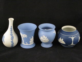 A Wedgwood blue Jasperware vase the base marked K 4", a  Wedgwood waisted vase 4", a club shaped vase and a circular  vase