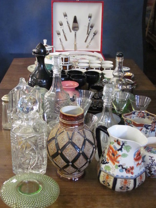 A part Crownford tea service, a part Windsor coffee service, a collection of jugs, cake plate with forks and slice, a musical  decanter, 6 cocktail glasses marked Pink Lady, decorative  glassware, dishes etc, etc
