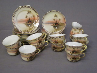A 30 piece Nippon porcelain tea service comprising 11 circular 6" plates - 3 chipped, 7 saucers - 3 chipped, cream jug, 11 cups -  7 cracked