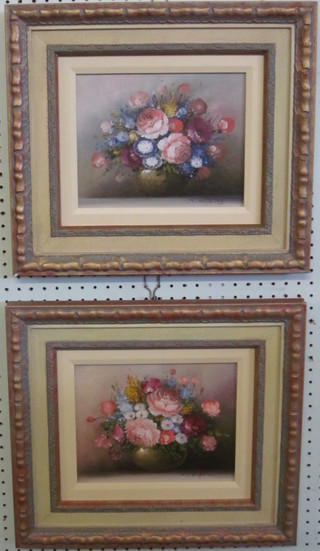 M Hopkins, a pair of oil paintings on board, still life studies, "Vases of Flowers" 7 1/2" x 9"