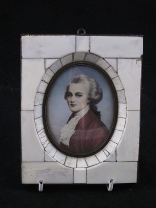 A portrait miniature of a gentleman contained in an oval frame 3"