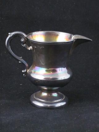 A Victorian silver sparrow beak cream jug, raised on a circular spreading foot, Sheffield 1863, 3 ozs