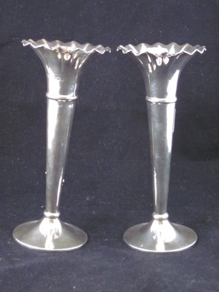A pair of Victorian silver trumpet shaped specimen vases 7", marks rubbed,