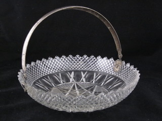 A circular cut glass bon bon dish with silver plated swing handle  10"