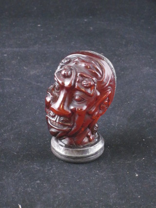 A carved Eastern seal in the form of a gentleman's head 2 1/2"