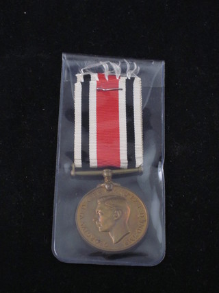 A George VI Issue Special Constabulary Long Service Good Conduct medal to Joseph Hughes