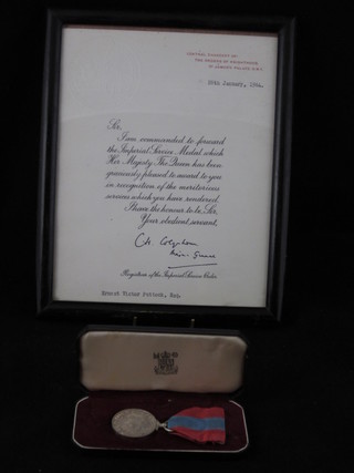 An Elizabeth II Issue Imperial Service medal to Ernest Victor Puttock together with a certificate