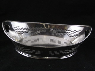 A pierced silver plated boat shaped basket by Maple & Co