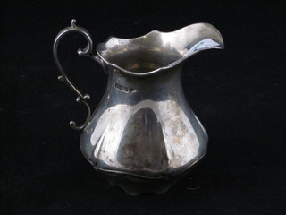An Art Nouveau silver cream jug, Sheffield 1910, 4 ozs