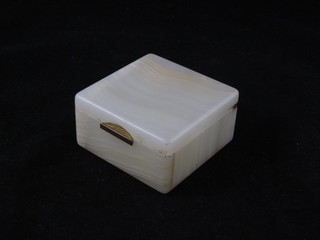 A square onyx Betjamen's patent cigarette box with hinged lid  4", some chips