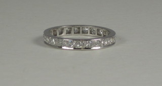 A lady's 18ct white gold or platinum full eternity ring set diamonds