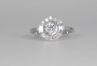An 18ct white gold Art Deco style dress ring set a diamond surrounded by diamonds, approx 0.70ct