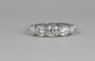 An 18ct white gold engagement/dress ring set 5 diamonds,  approx 2.50ct