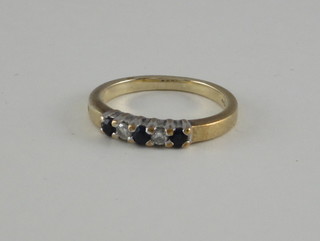 A lady's yellow gold dress ring set 2 diamonds and 3 sapphires