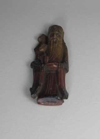A carved soap stone figure of a Deity 4"