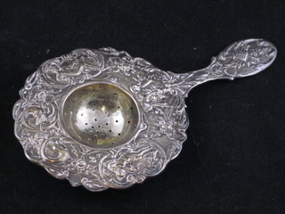 A Continental silver tea strainer, handle f and r,