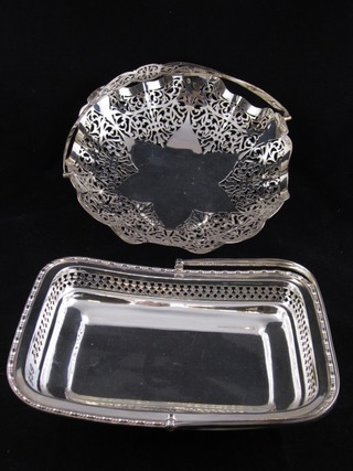 A circular pierced silver plated cake basket with swing handle and a rectangular cake basket