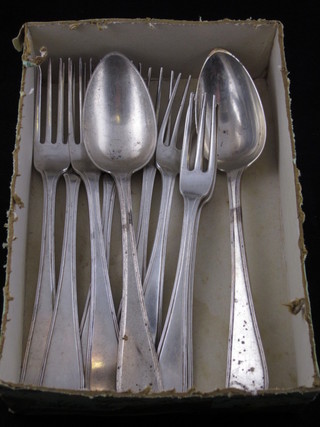 A Continental dessert spoon together with 4 Continental table  forks and 5 Continental forks