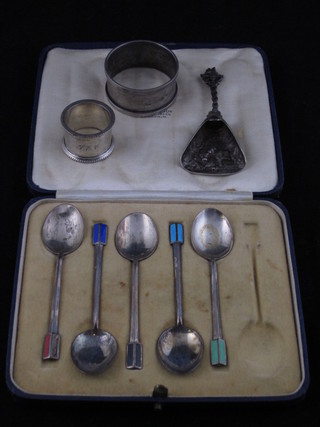 A set of 5 Art Deco silver and enamel coffee spoons Birmingham  1934 together with a Dutch embossed caddy spoon and 2 napkin  rings