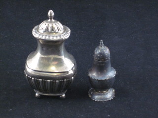 A Victorian silver pepperette Chester 1898 and a miniature silver pepperette, 2 ozs