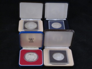 A 1978 Jersey Royal Visit silver proof crown together with 2  Turks and Caicos crowns and a Bahamas anniversary crown