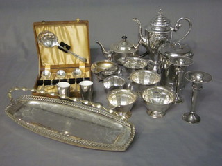 An embossed silver plated pepper pot, a 3 piece silver plated tea service, a silver plated ice pail and other plated items