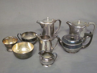A 3 piece Britannia metal tea service together with a 3 piece hotelware tea service