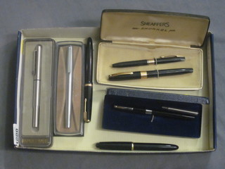 A Koh.1.Nor Designer pen, a Parker fountain pen, a Lady  Sheaffer fountain pen, a Sheaffer New Snorkel fountain pen and  1 other, a Conway Stuart fountain pen in a brushed steel case and  a Paperweight ballpoint pen